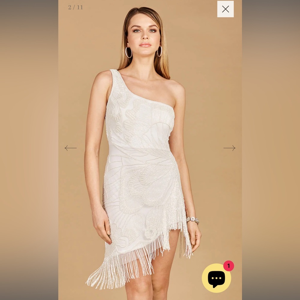 ONE SHOULDER
COCKTAIL DRESS WITH FRINGE